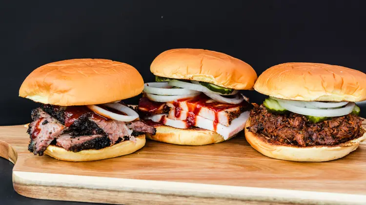 All-natural brisket, ribs, turkey, chicken, and pork from True Texas BBQ, slow-smoked over Texas post oak