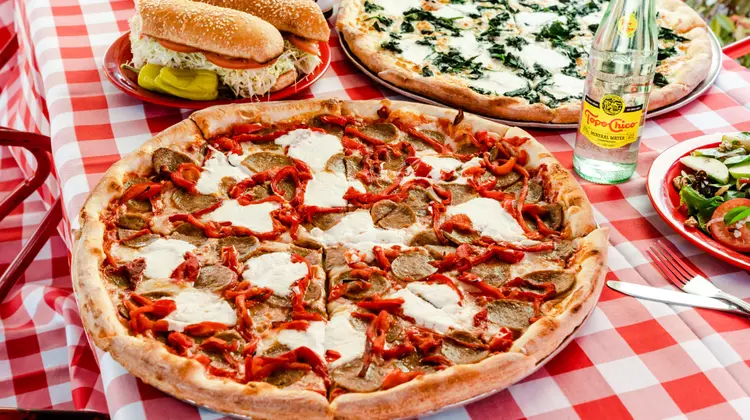 Ranked fourth best pizza in the U.S. by Yelp, Home Slice Pizza has been serving authentic New York-style pizza and subs since 2005.